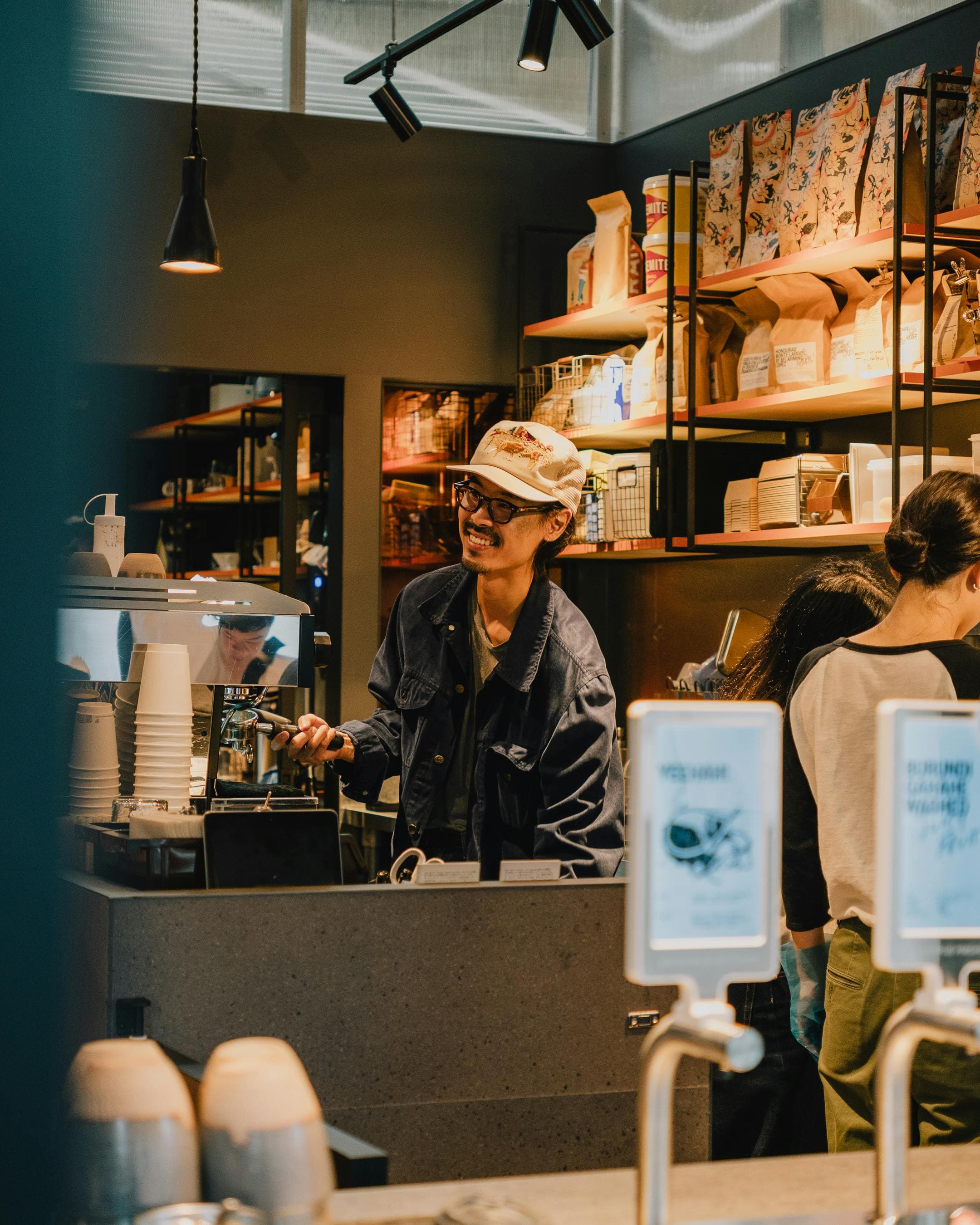 A small business team welcoming customers